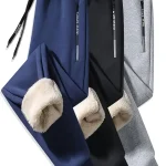 Men's Fleece-Lined Joggers - Men, casual wearers, joggers enthusiasts, everyday wearers - Solid color, pocket, regular fit, machine wash, casual style, synthetic fabric, slight stretch, knit fabric, no printing, no dry clean, no sheer - Suitable for Casual wear, Outdoor activities, Gym workouts